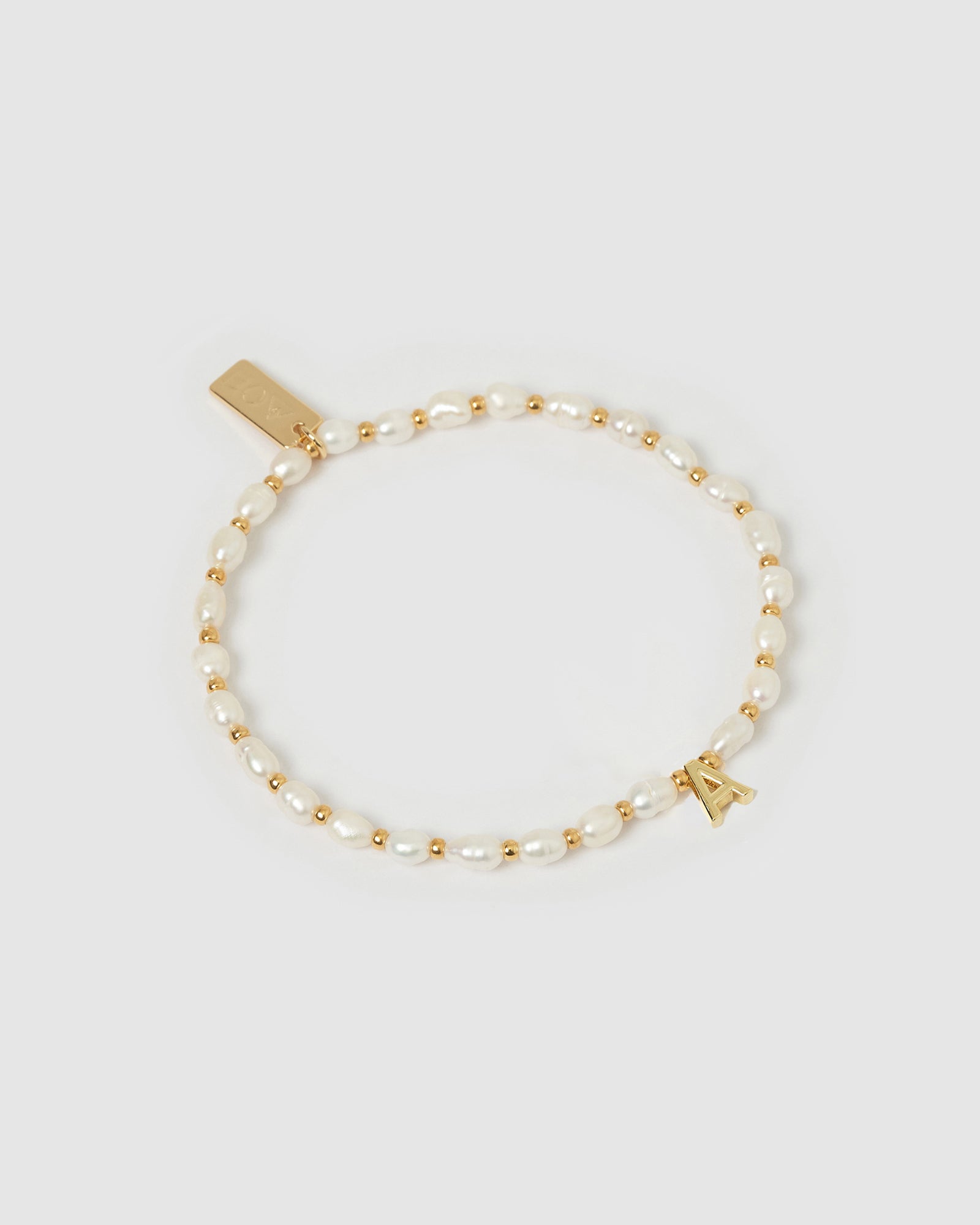 PEARL_INITIAL_BRACELET_A_1_54047846-f924-4cfa-94a0-fec47c512a2b.jpg